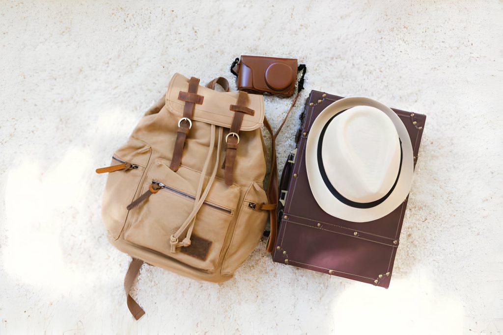 Vintage leather rucksack backpack with adjustable straps and spacious compartments for outdoor adventures.
